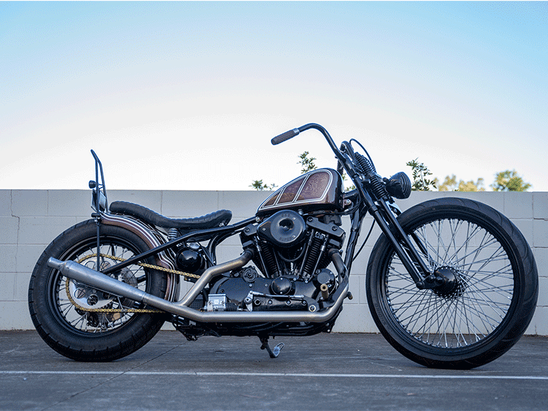 Check out this rad Shovelhead with custom Springer by
